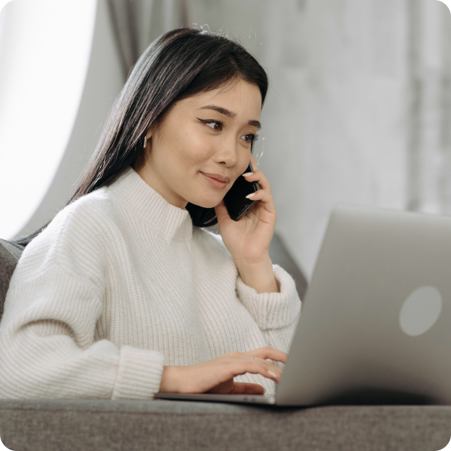 A professional using SimpleSpeak on a laptop
