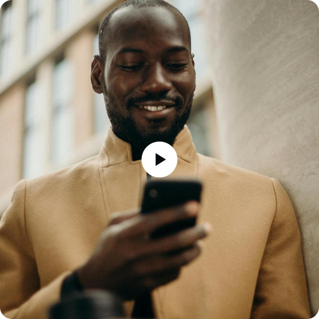 Person using a Kore.ai virtual assistant on a mobile phone